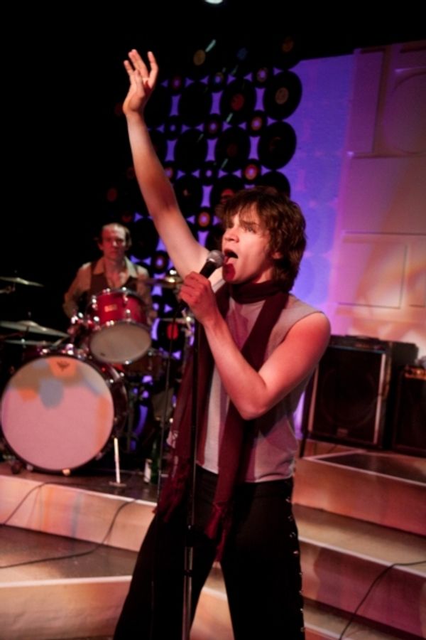 Charlie (Bries Vannon) plays the drums while Mick (Nick Vidal) sings Photo